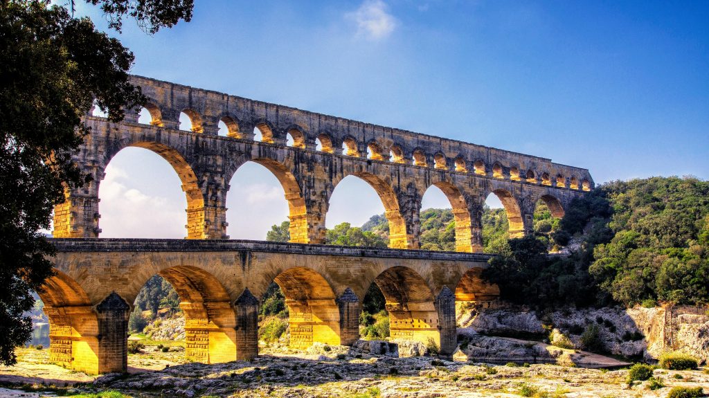 Captivating image of the ancient Roman aqueduct Pont du Gard in Occitanie, France.